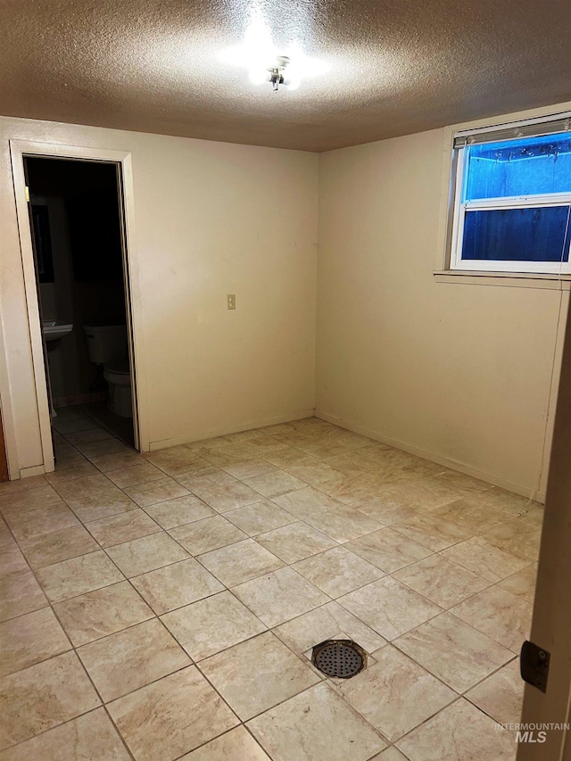 2320 S Illinois, Caldwell, ID 83605 - empty room featuring a textured ceiling