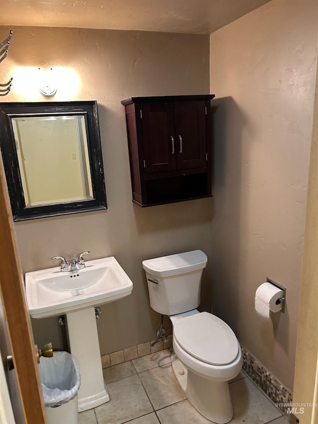 2320 S Illinois, Caldwell, ID 83605 - bathroom featuring toilet and tile patterned flooring