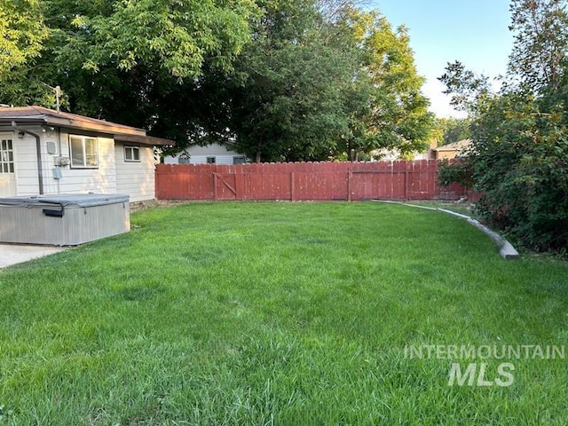 2320 S Illinois, Caldwell, ID 83605 - fenced backyard featuring a hot tub