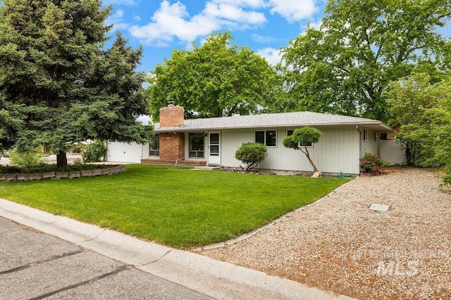 5928 W Grunder, Boise, ID 83709 - ranch-style house with a chimney and a front lawn