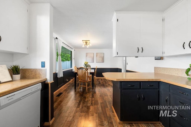 5928 W Grunder, Boise, ID 83709 - kitchen featuring dishwasher, light countertops, white cabinets, dark wood-style floors, and a peninsula