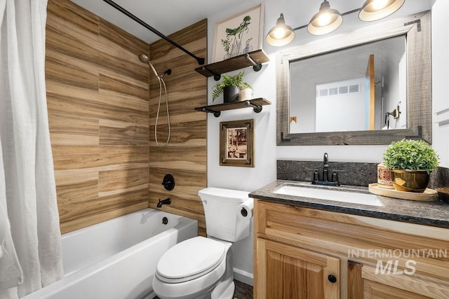 5928 W Grunder, Boise, ID 83709 - bathroom with shower / bathtub combination with curtain, vanity, and toilet