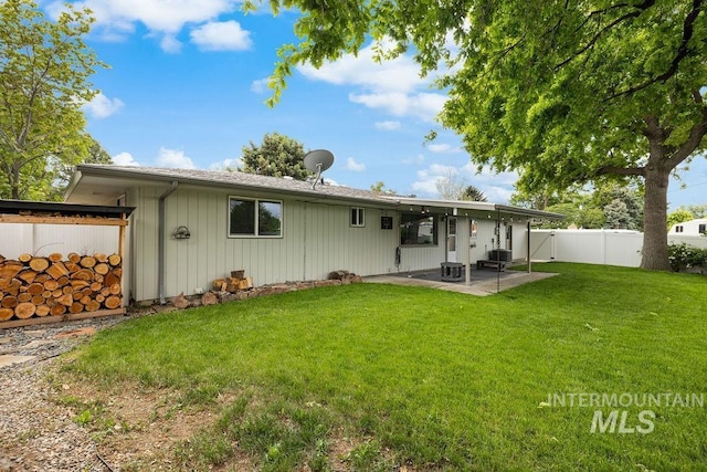 5928 W Grunder, Boise, ID 83709 - rear view of house with a patio