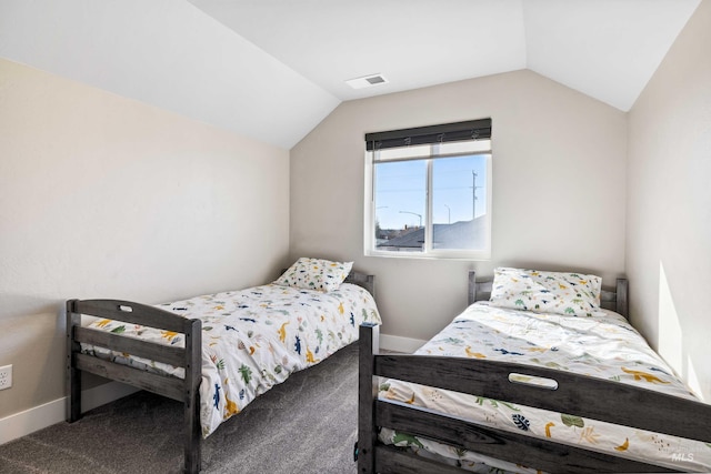 bedroom with vaulted ceiling, baseboards, visible vents, and carpet floors