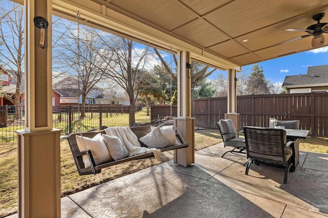 view of patio / terrace featuring outdoor dining space and a fenced backyard