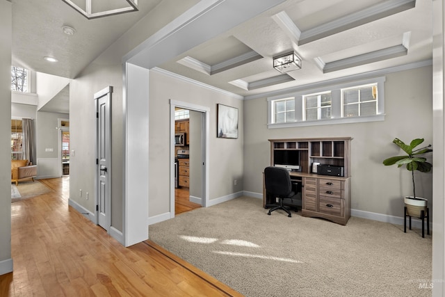 carpeted office featuring beamed ceiling, coffered ceiling, crown molding, and baseboards