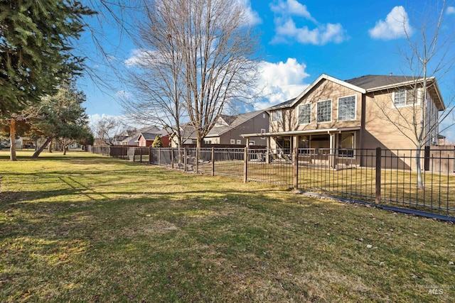 view of yard featuring a fenced backyard