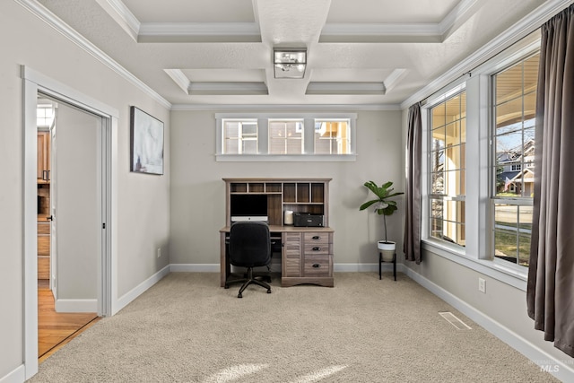 carpeted office space with visible vents, baseboards, and ornamental molding