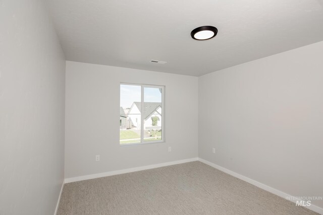 7341 E Dripping Springs Dr, Nampa, ID 83687 - unfurnished room featuring baseboards and carpet flooring