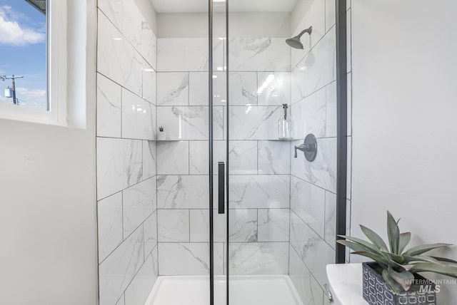 bathroom featuring a stall shower