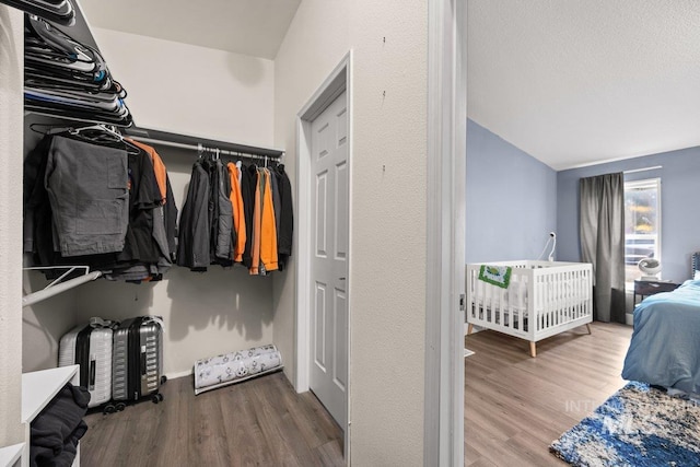 529 S State St, Nampa, ID 83686 - walk in closet featuring wood finished floors and vaulted ceiling
