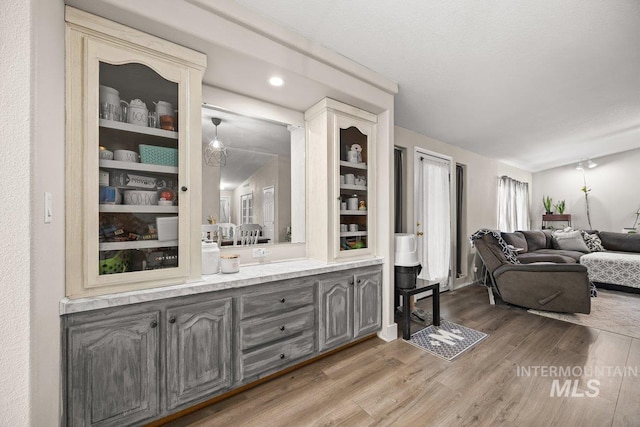 529 S State St, Nampa, ID 83686 - bar area featuring wood finished floors