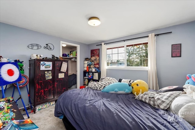 carpeted bedroom featuring a closet