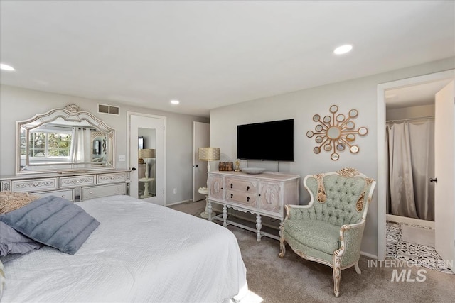 carpeted bedroom featuring recessed lighting and visible vents