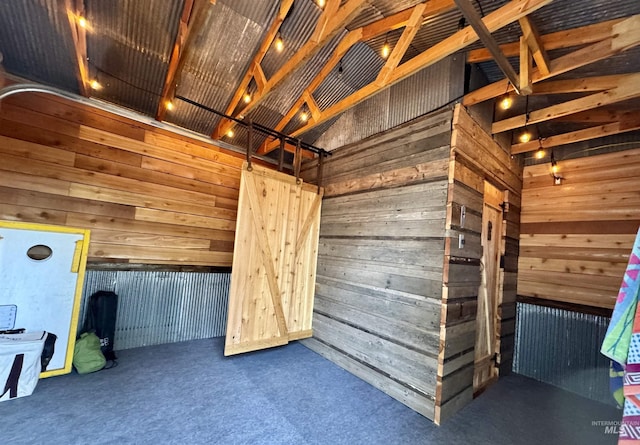 1223 Forest Rd, Winchester, ID 83555 - interior space featuring wood walls and carpet floors