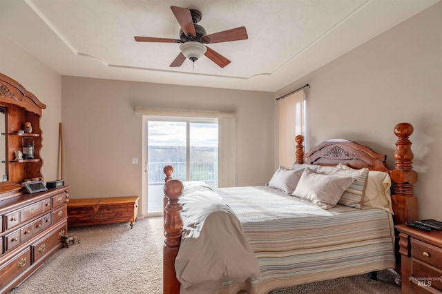 carpeted bedroom with access to outside and ceiling fan