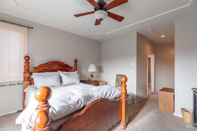 carpeted bedroom featuring ceiling fan