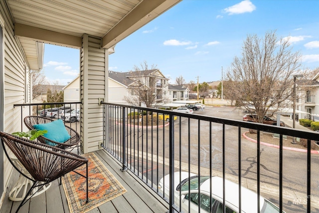 balcony featuring a residential view