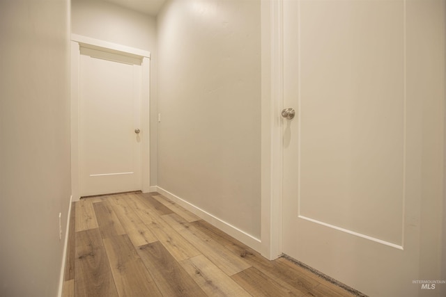 corridor featuring light wood-type flooring