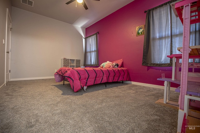 carpeted bedroom with lofted ceiling and ceiling fan