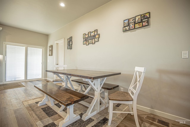 dining room featuring hardwood / wood-style flooring