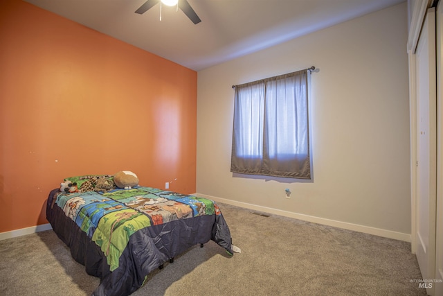 bedroom with light carpet and ceiling fan