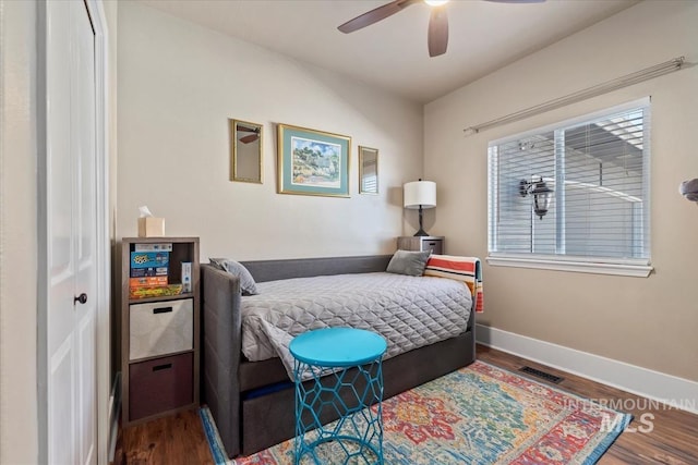 bedroom featuring ceiling fan and wood-type flooring