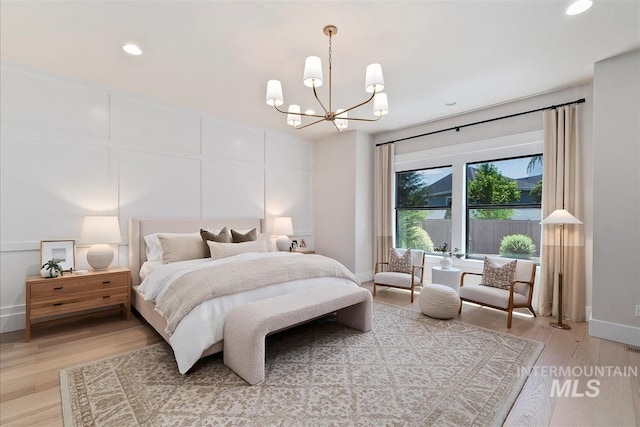 2685 N Fruniz Ave, Eagle, ID 83616 - bedroom featuring a chandelier, light wood-type flooring, and recessed lighting
