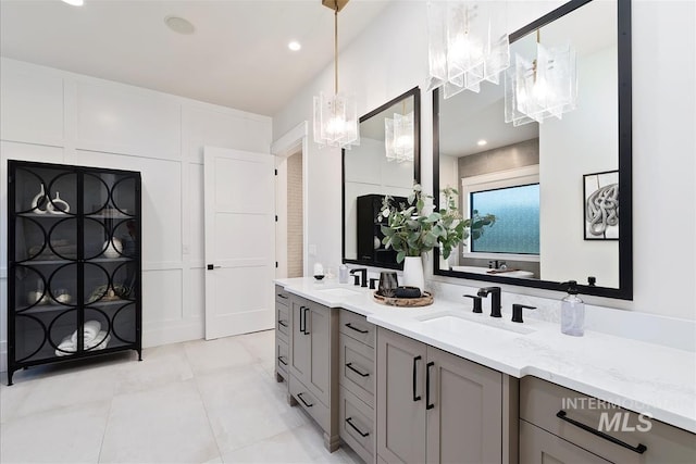2685 N Fruniz Ave, Eagle, ID 83616 - bathroom with double vanity, a chandelier, and tile patterned flooring