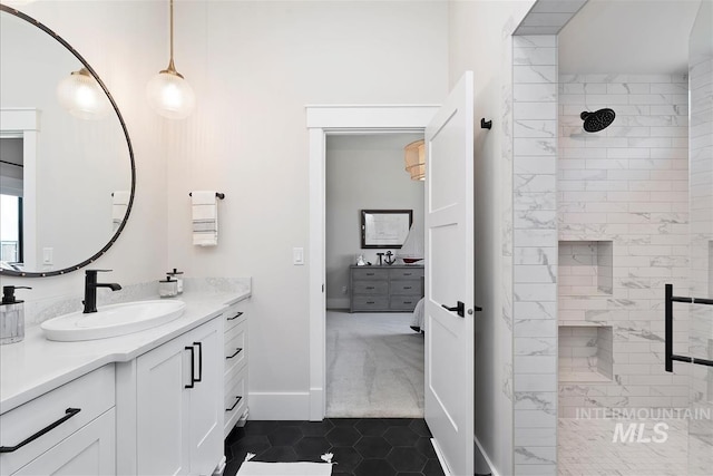 2685 N Fruniz Ave, Eagle, ID 83616 - ensuite bathroom with vanity, a tile shower, and tile patterned flooring
