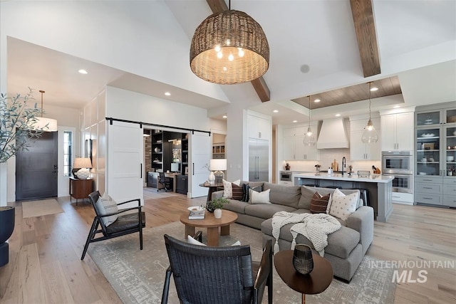2685 N Fruniz Ave, Eagle, ID 83616 - living room featuring high vaulted ceiling, light wood-style flooring, beam ceiling, and recessed lighting