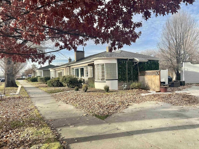 view of home's exterior featuring a sunroom