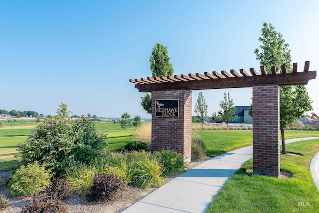 view of community featuring a lawn