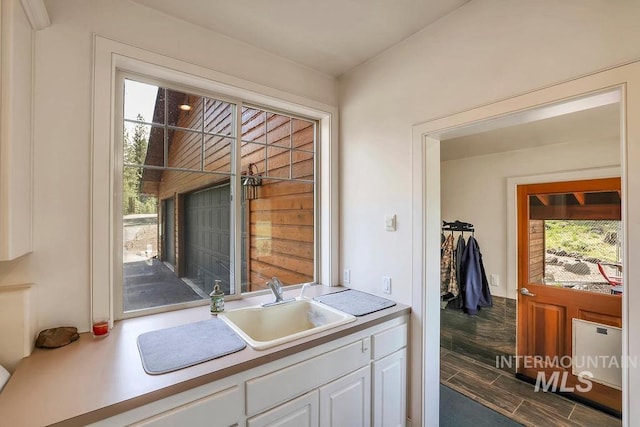 2510 Price Valley Rd, New Meadows, ID 83654 - kitchen featuring plenty of natural light, white cabinetry, a sink, and light countertops