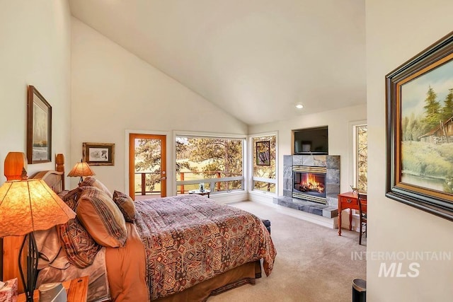 2510 Price Valley Rd, New Meadows, ID 83654 - carpeted bedroom with a tile fireplace, high vaulted ceiling, recessed lighting, and access to outside
