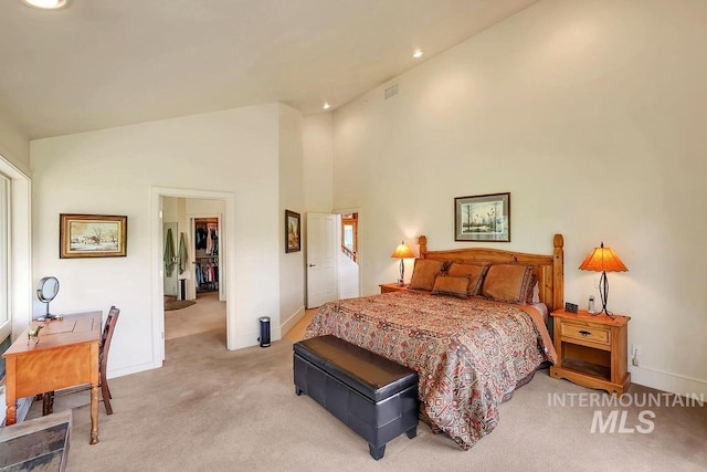 2510 Price Valley Rd, New Meadows, ID 83654 - bedroom with light colored carpet, baseboards, recessed lighting, and high vaulted ceiling