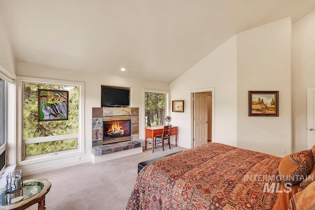 2510 Price Valley Rd, New Meadows, ID 83654 - carpeted bedroom featuring a tiled fireplace, recessed lighting, and high vaulted ceiling