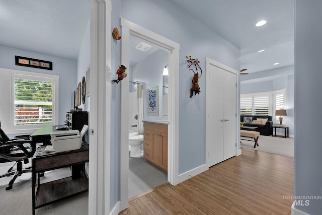 hallway featuring light hardwood / wood-style flooring