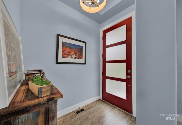 entrance foyer featuring hardwood / wood-style floors