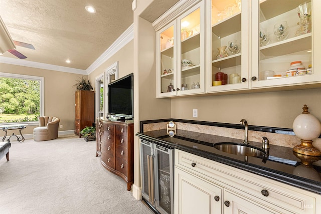 1137 N Cobblestone Way, Eagle, ID 83616 - bar featuring beverage cooler, crown molding, a sink, a textured ceiling, and light colored carpet