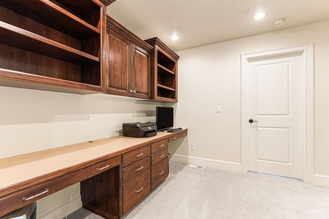 1137 N Cobblestone Way, Eagle, ID 83616 - home office with built in study area, recessed lighting, light colored carpet, a textured ceiling, and baseboards