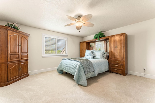 1137 N Cobblestone Way, Eagle, ID 83616 - bedroom with baseboards, light carpet, a textured ceiling, and ceiling fan