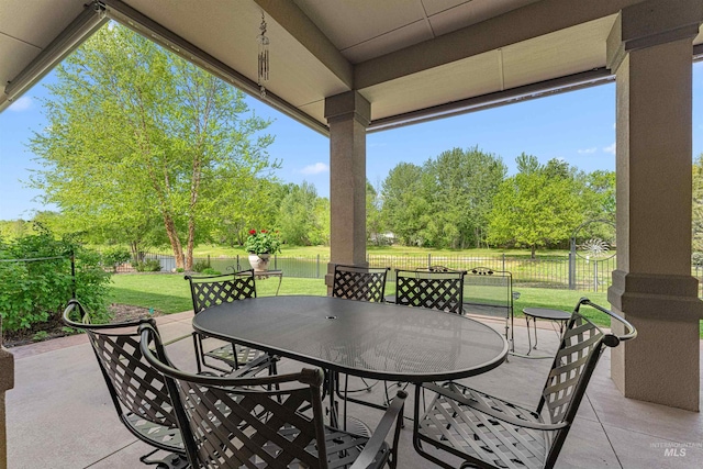 1137 N Cobblestone Way, Eagle, ID 83616 - view of patio / terrace with outdoor dining area and view of wooded area