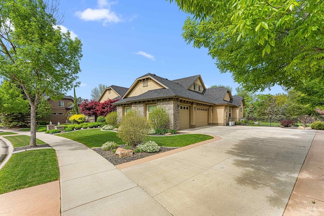 1137 N Cobblestone Way, Eagle, ID 83616 - view of front of property with a garage, concrete driveway, a front lawn, a shingled roof, and stone siding