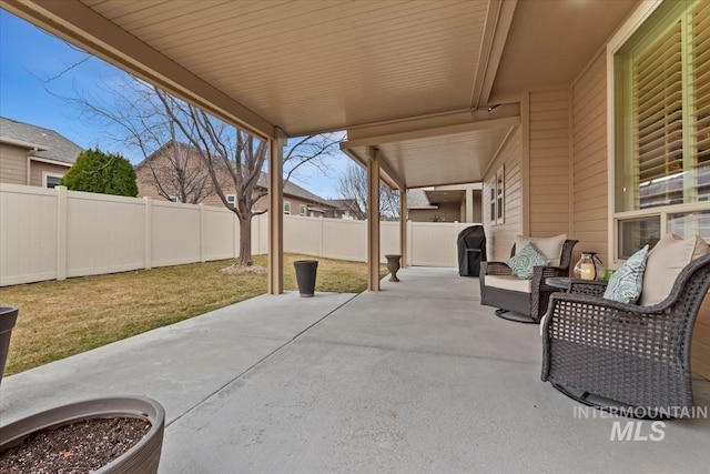 view of patio with a fenced backyard