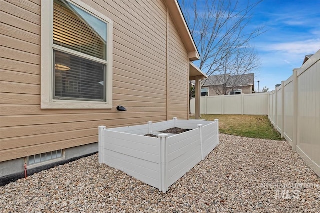 view of home's exterior featuring a fenced backyard