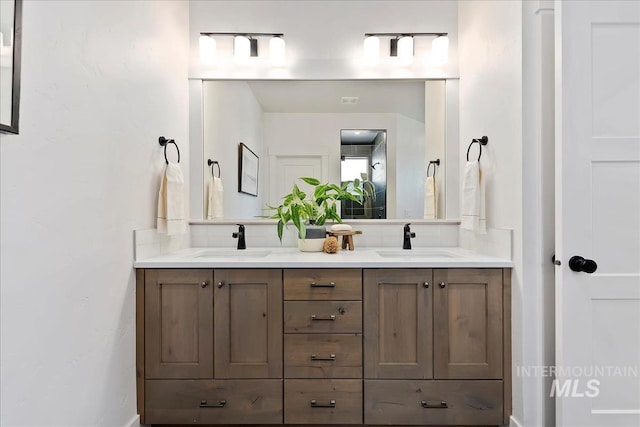 4608 N Alameda Creek Ave, Meridian, ID 83646 - bathroom with double vanity and a sink
