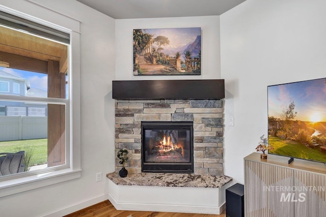633 Reese Rd, Twin Falls, ID 83301 - detailed view of wood finished floors and a stone fireplace