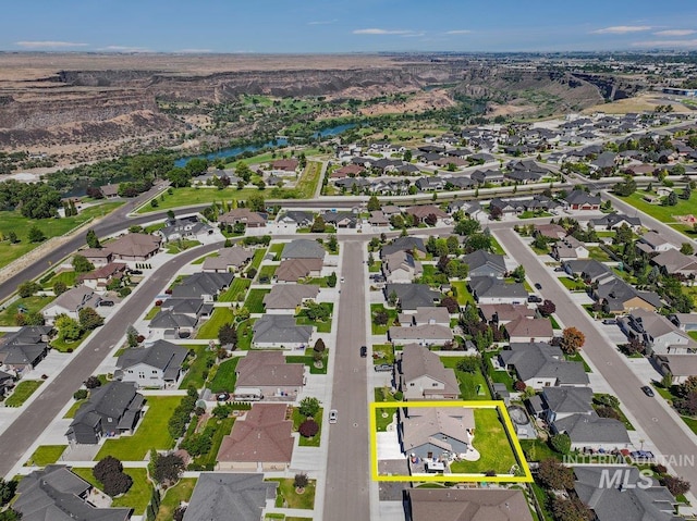 633 Reese Rd, Twin Falls, ID 83301 - aerial perspective of suburban area with property parcel outlined and a nearby body of water