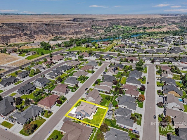 633 Reese Rd, Twin Falls, ID 83301 - aerial view of property and surrounding area featuring property boundaries highlighted and nearby suburban area
